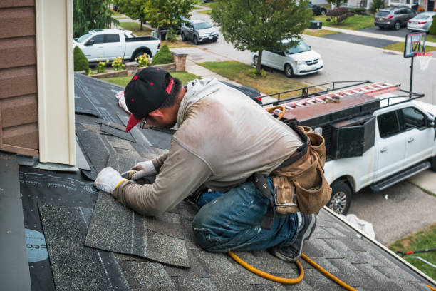 Professional Roofing technician working in Saint Charles, MI